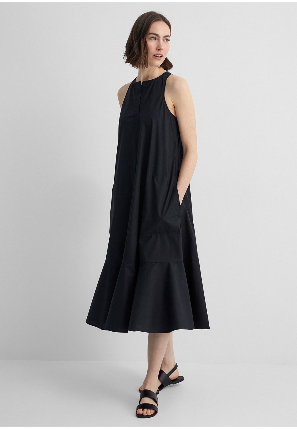 Чёрное женственное платье  ABIGALE с воланом