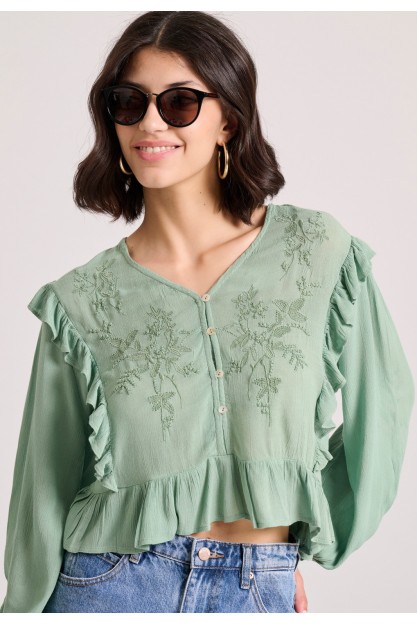 Блуза с длинными рукавами и рюшами